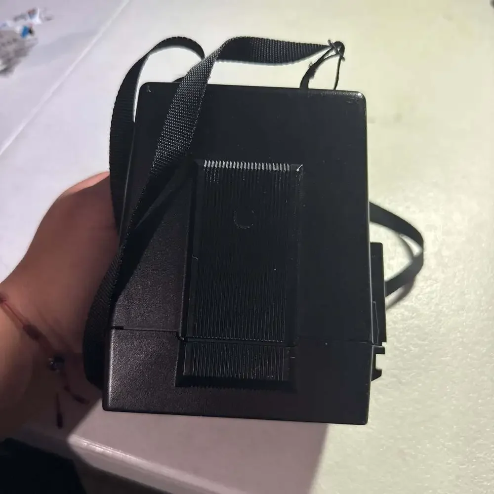 Vintage Polaroid Sun 600 LMS Instant Camera with Strap